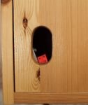 Image of hole with token.