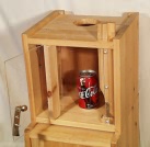 Image of reinforcer container with door open. Click on the image for a larger version.